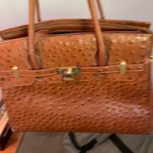 Leather handbag with strap